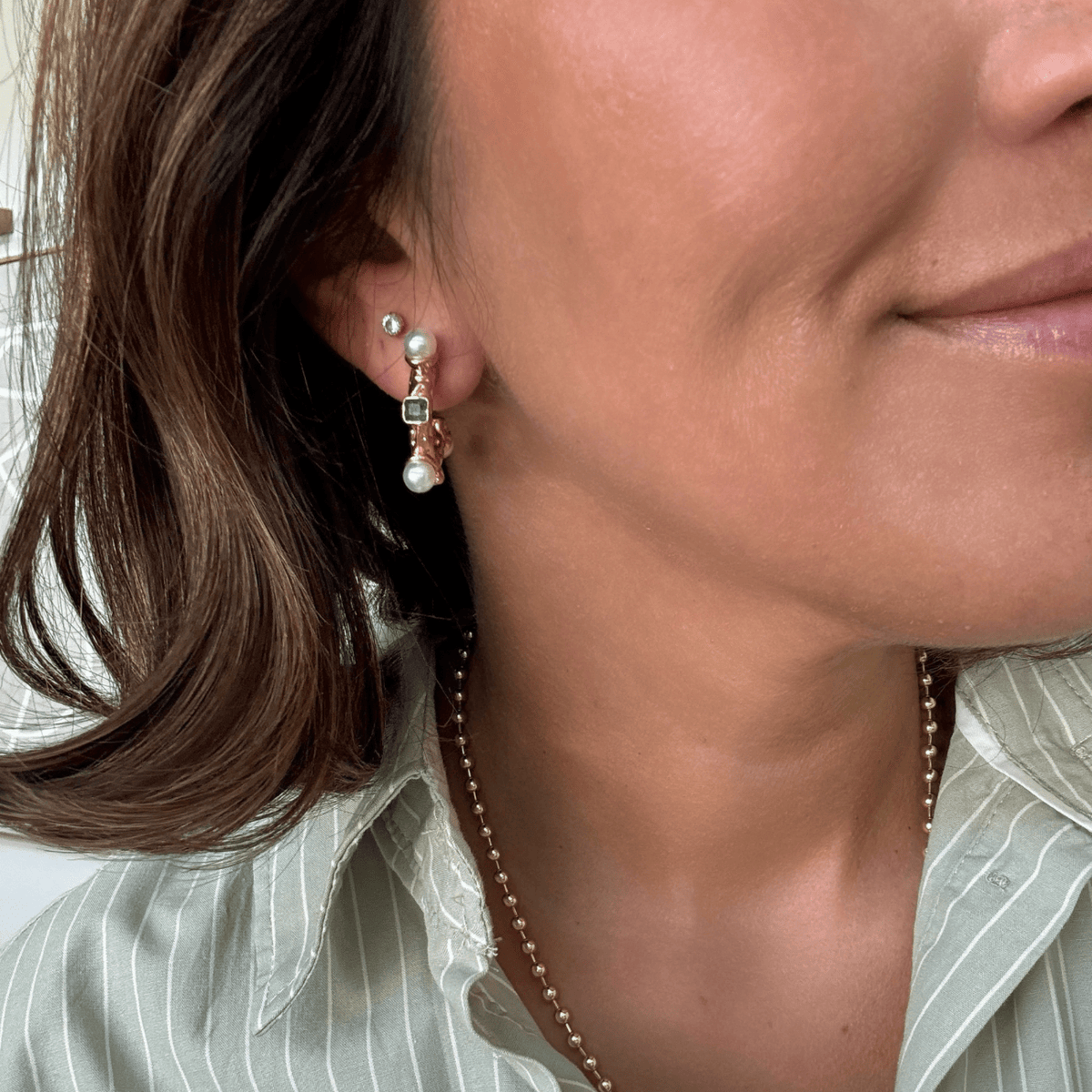 Emerald Glow Hoops Earrings by BRACHA