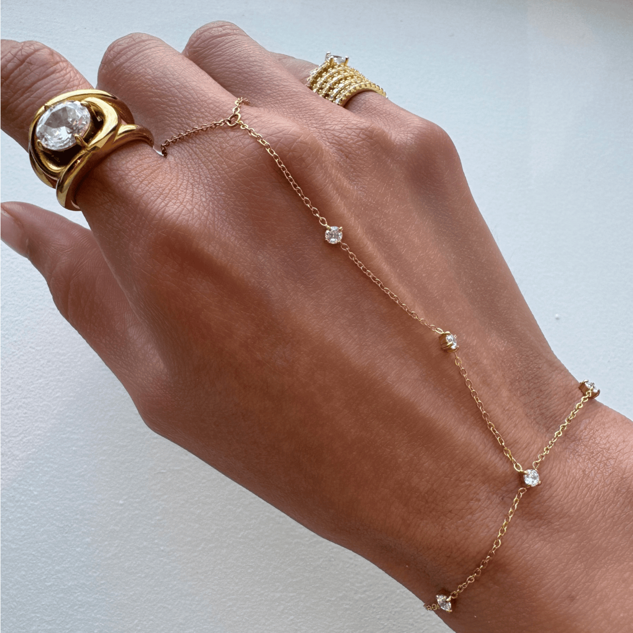 Luminance Hand Chain Bracelets by BRACHA